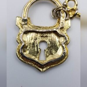 Sterling silver with gold vermeil antique lock and key necklace pendant
